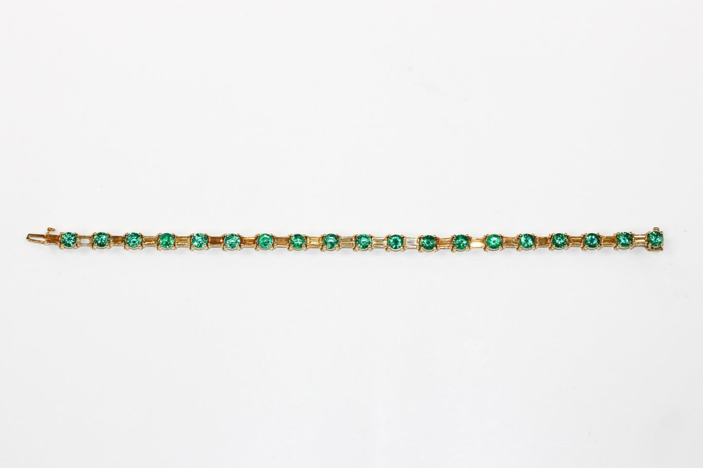 14KT Yellow Gold Tennis Bracelet With Emeralds and Topaz